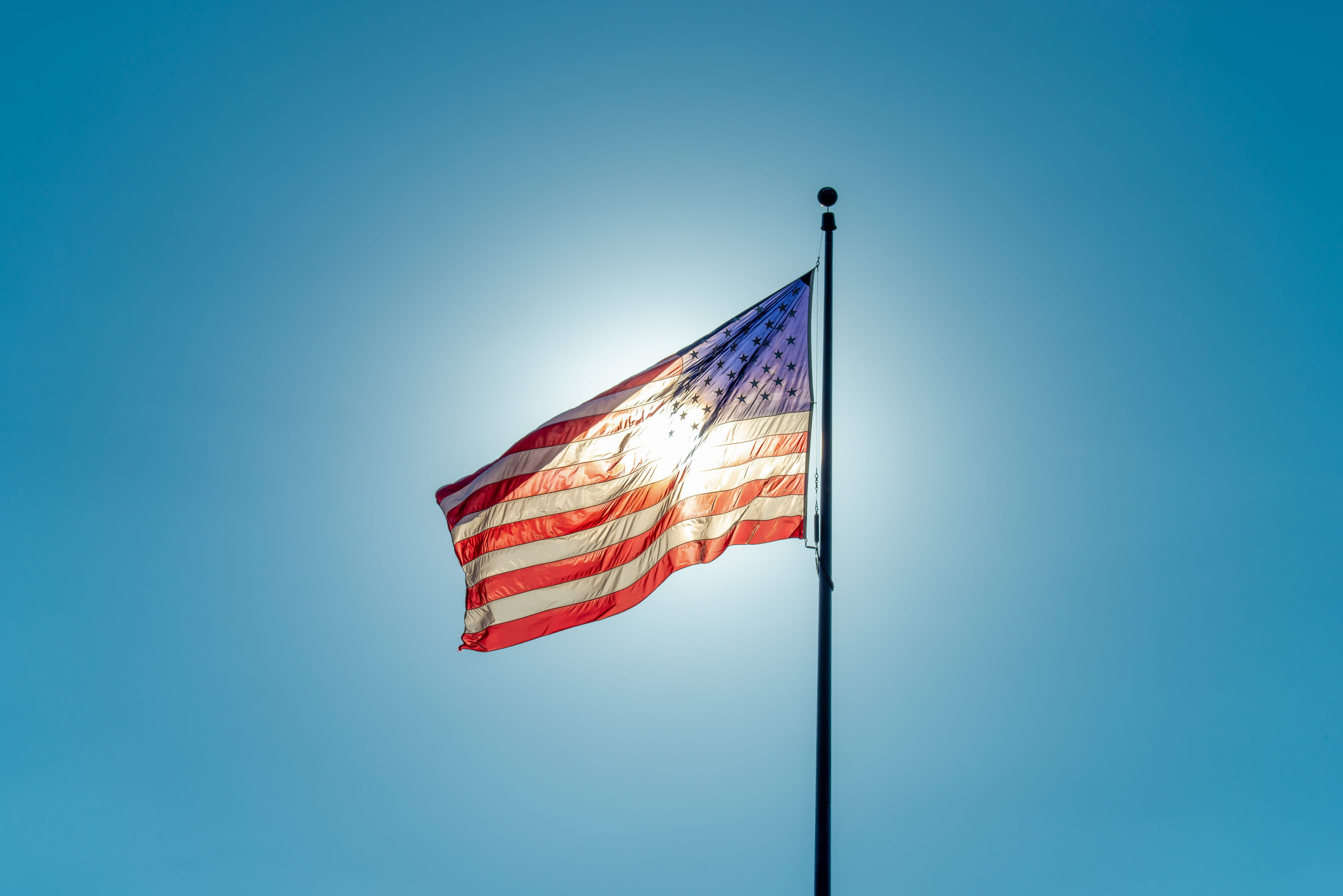 The United States Of America Flag Blowing In The Wind
